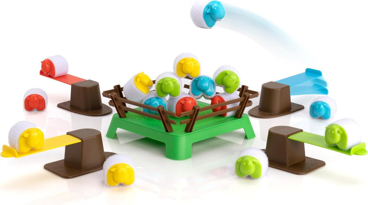 Heap-O-Sheep game showing colorful sheep being catapulted onto the hook-and-loop paddock for stacking and play.