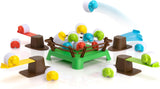Heap-O-Sheep game showing colorful sheep being catapulted onto the hook-and-loop paddock for stacking and play.