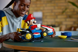 Mario Kart Mario & Standard Kart model with posable Mario figure displayed on a stand, perfect for gaming fans.