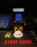 Tiny Arcade Pacman shows a miniature arcade game with joystick and screen displaying Pac-Man maze gameplay.