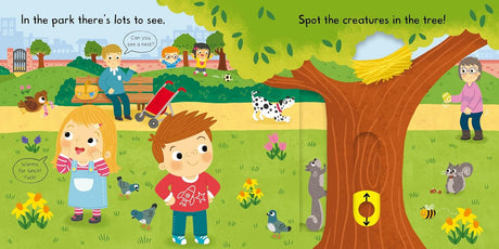 Busy Park Push/Pull/Slide board book showing children playing, animals, and nature in a colorful park scene.