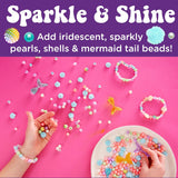 Bead Jewelry Jar | Mermaid with iridescent beads, shells, mermaid tail charms, and bracelets on a pink background.