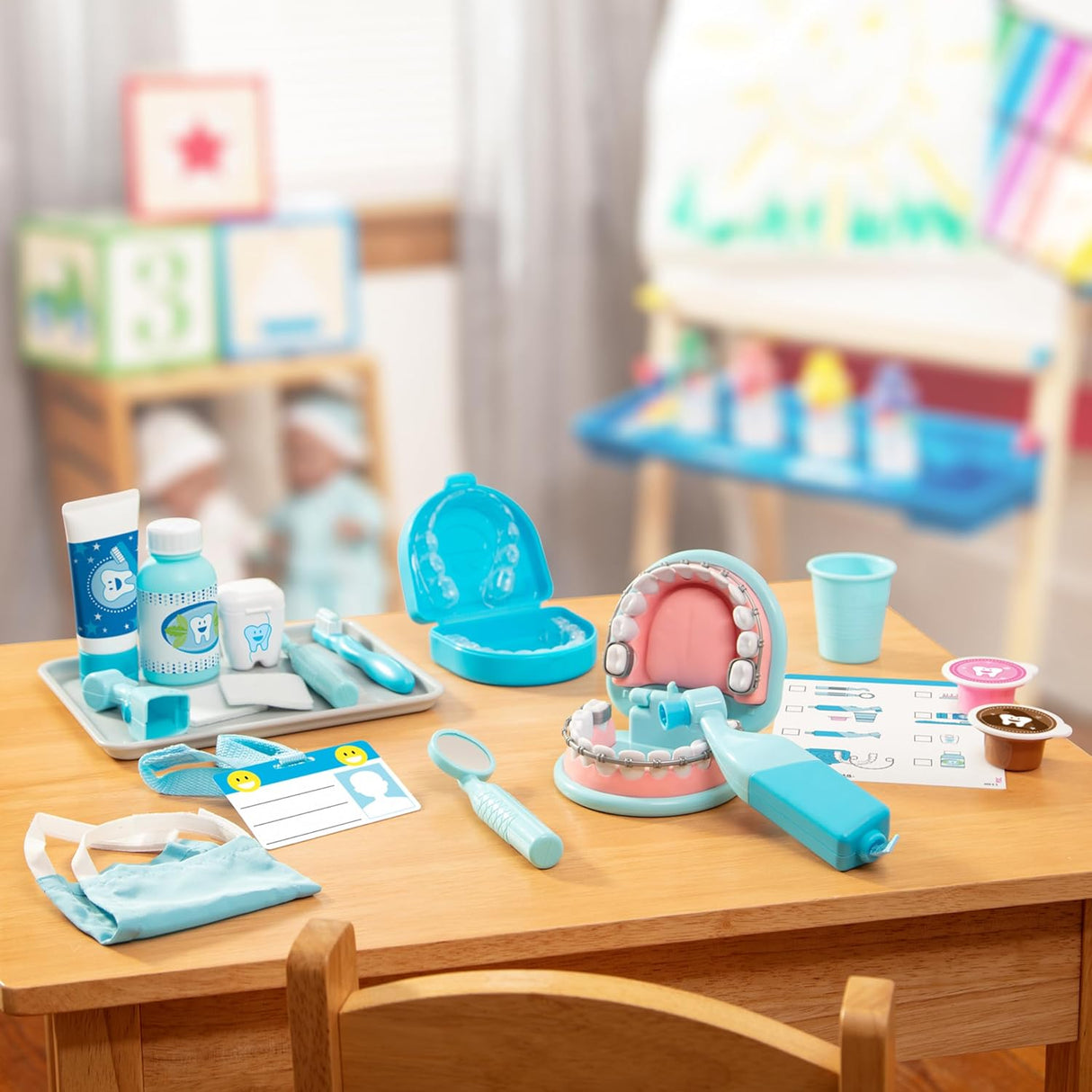 Super Smile Dentist Play Set with oversized teeth, dental tools, braces, mask, and activity cards for kids.