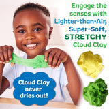 Sensory Pack | Farm featuring a child playing with stretchy, super-soft cloud clay in vibrant yellow and green colors.