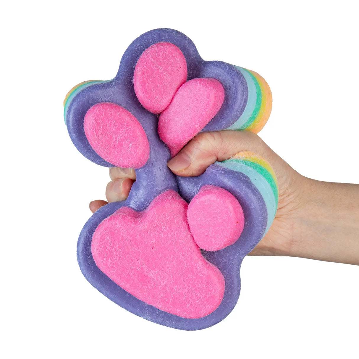 Hand squeezing a colorful Taba-licious Jumbo Paws Squishy with soft, fuzzy texture and oversized paw design.