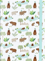 Capybara Life Journal with playful capybara and nature illustrations, light blue elastic closure, and durable hardcover binding.