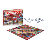 Monopoly Portland, Maine Edition board game with custom tokens and colorful board featuring local landmarks and icons.