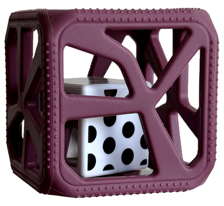 Chew Cube | Purple teething rattle with multi-textured surfaces and black and white polka dot center cube for babies.