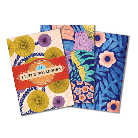 Little Notebooks | Cecilia featuring three small colorful notebooks with floral artwork and gilded edges.