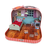 Sam & Julia | Mouse Mansion to Go miniature bedroom in a striped suitcase with bed, toys, and furniture pieces.