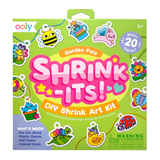 Shrink-Its! Garden Pals DIY Shrink Art Kit with colorful garden-themed charms, cords, and ball chains for crafting.