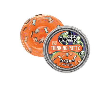 Mini Trick or Treat | Skeleton Thinking Putty orange putty with skeleton shapes in a small tin container for kids ages 3 and up.
