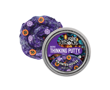 Mini Trick or Treat | Haunted House Thinking Putty in dark purple with spooky Halloween pieces.