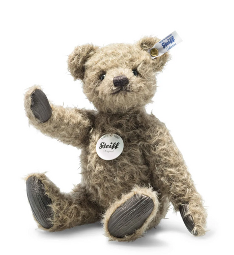 Teddy Bear German Open Edition Howie with caramel mohair, faux leather paws, embroidered face, and classic Steiff tag.
