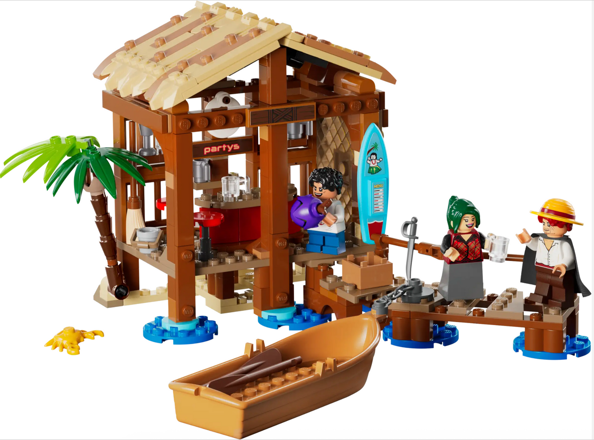 ONE PIECE Windmill Villiage Hut with removable roof, minifigures, pirate boat, and beachside accessories displayed.