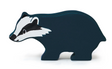 Smooth natural wooden toy shaped like a friendly little badger, perfect for imaginative play and storytelling.