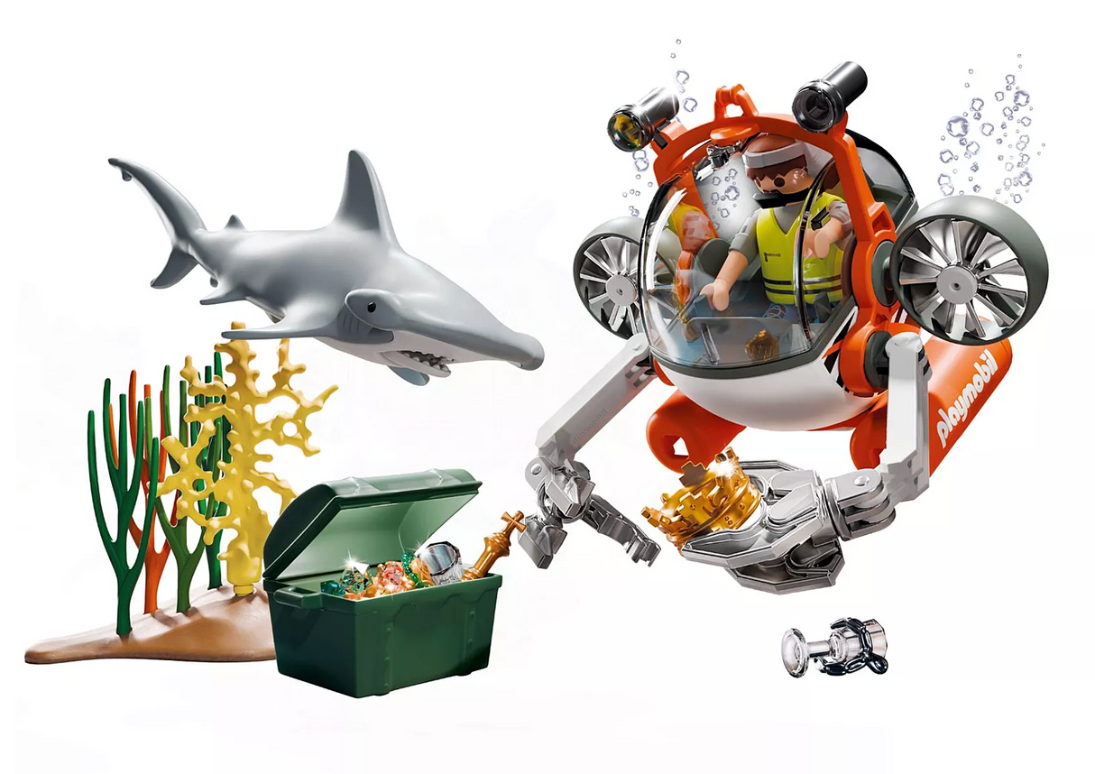 Submarine with driver holding golden crown near treasure chest and shark with seaweed in underwater scene toy set