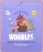 Peat the Troll crochet kit packaging with colorful design and glitter yarn included for beginner crafters.