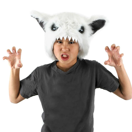 Child wearing the Yeti Soft Hat with white fur, black eyes, foam rubber teeth, and adjustable velcro strap.
