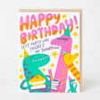 Dino Happy Birthday Party Card with colorful dinosaurs and festive hats celebrating with cake and drinks.