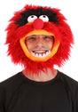 Man wearing The Muppet Show Animal Jawesome Hat with red faux fur and character eyes and nose details.