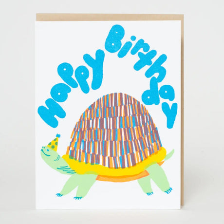Happy Birthday Turtle Card featuring a colorful turtle with a party hat and playful blue lettering.