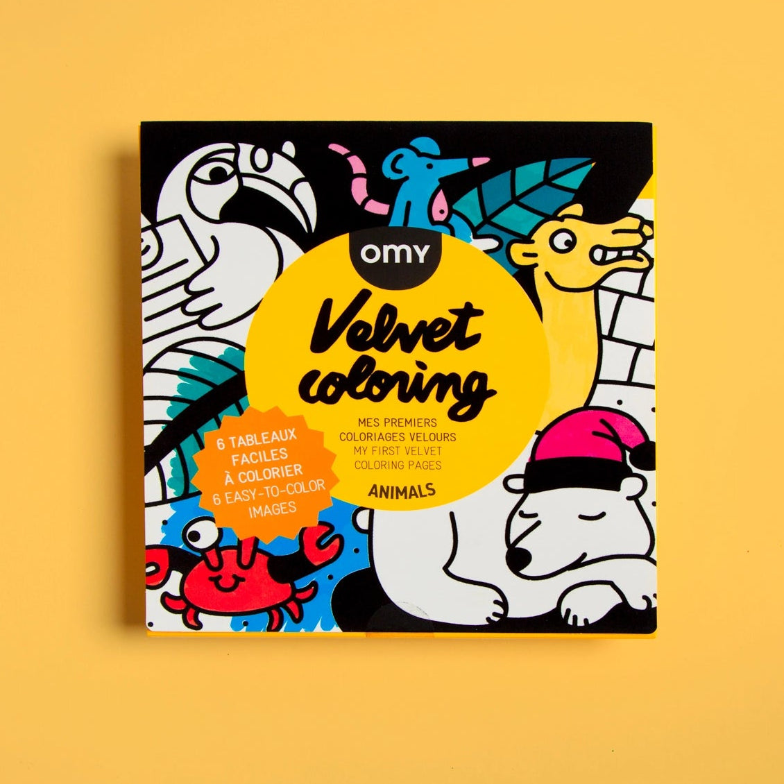 Coloring book with six easy-to-color velvet animal designs including a crab, polar bear, camel, and toucan on a yellow background.