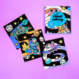 Set of colorful velvet coloring sheets with space-themed illustrations on a purple background for kids ages 3 to 7.