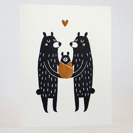 New Baby Black Bears Card showing two parent bears holding a wrapped baby bear with a heart above, letter-pressed by Fugu Fugu!