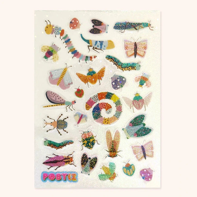 Colorful holographic bug stickers featuring various bright and funky insects on a clear sheet