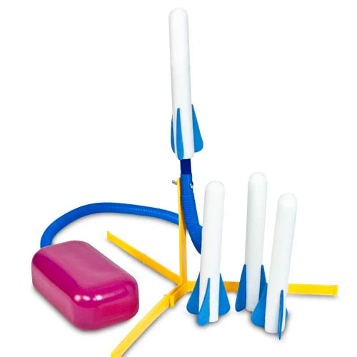 Stomp Rocket Junior with four foam-tipped rockets, yellow launch stand, and purple air pump for kid-powered outdoor fun.