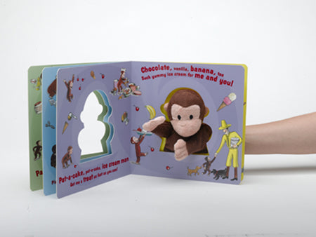Curious George Pat-A-Cake board book with interactive puppet and colorful illustrations for toddlers.