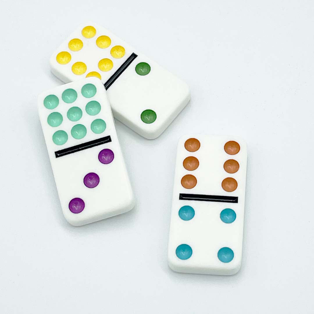 Double 12 Dominoes set showing colorful domino tiles with yellow, green, purple, brown, and blue dots on white background.