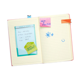 Color Write Sticky Tabs showing colorful sticky notes and tabs used for organizing a notebook with reminders and drawings.
