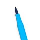 Close-up of a blue Brilliant Brush Marker showing its soft, long brush tip for detailed and broad strokes.