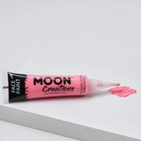 Face Paint Brush Tip - Adventure in pink with brush applicator and smooth paint stroke on white surface.