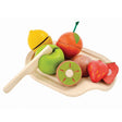 Cut Up Fruits Tray with wooden knife and colorful fruits including apple, lemon, orange, kiwi, and strawberry on a tray.