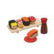PlanToys Sushi Set with wooden sushi pieces, tray, shoyu bottle, and sauce dish for pretend play.