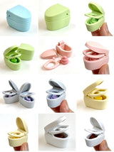 Japanese Eraser Toilet puzzle erasers in assorted colors with removable parts and a cute poo inside, perfect gift or decoration.