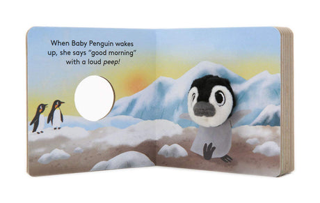 Baby Penguin with Finger Puppet board book featuring a plush penguin puppet in a snowy mountain setting.