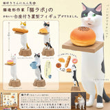 Cat Bakery Blind Box showing bakery-themed cat figurines holding bread and coffee on wooden bases, imported from Japan.