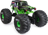 HUGE RC Grave Digger monster truck with oversized BKT tires, green chassis, and authentic Monster Jam graphics.