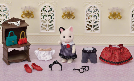 Cat Fashion Set featuring Tuxedo Cat Felicia with removable clothing, accessories, and display shelf in a miniature dollhouse setting.