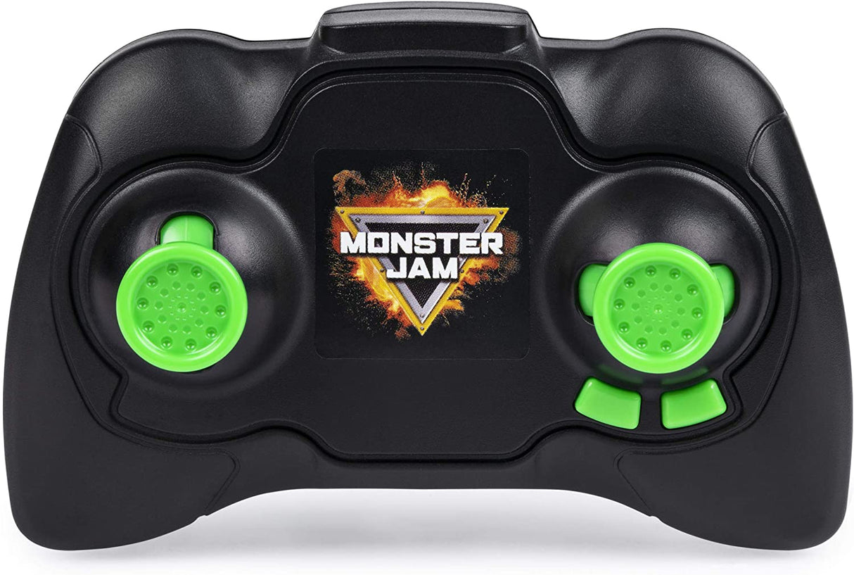 HUGE RC Grave Digger dual joystick controller with green buttons and Monster Jam logo in the center.