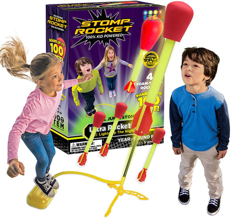 Children playing outdoors with Stomp Rocket Ultra LED launching foam rockets with bright LED lights.