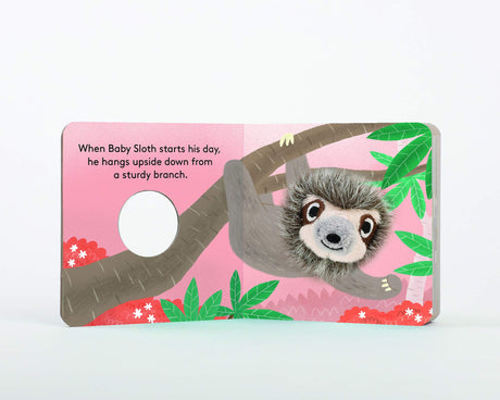 Baby Sloth with Finger Puppet board book showing plush sloth puppet hanging upside down on a tree branch.