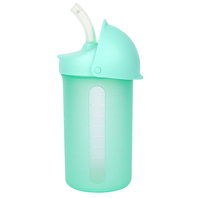 SWIG Sippy Cup Mint in light green with silicone straw, insulated walls, and rotating cover for spill prevention.