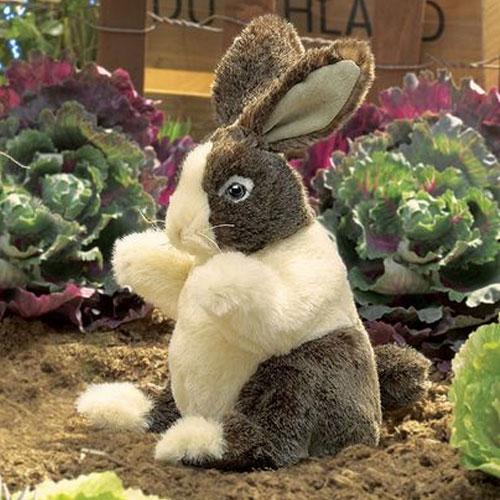 Dutch Rabbit Baby Puppet with cream and coffee markings, lifelike design, and moveable head and paws.