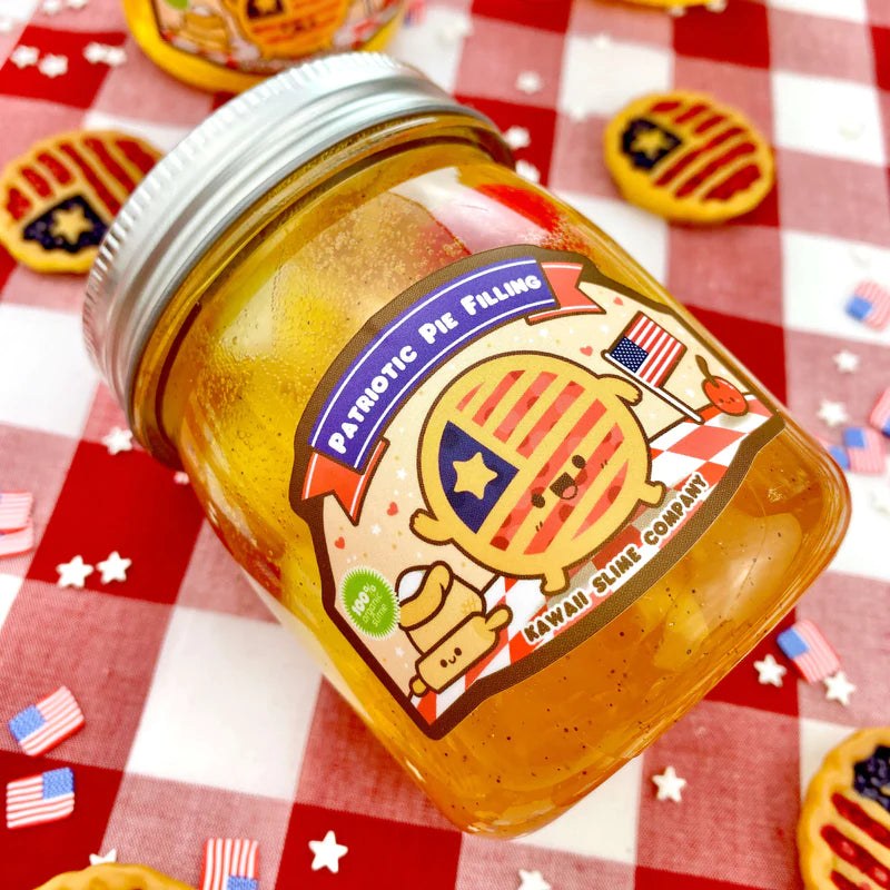Patriotic Pie Filling Jelly Cube Slime in jar with red, white, and blue decor and American flag-themed toppings.