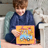 Child sitting on chair smiling and holding a colorful lacing card from Lacing Cards Good Deeds set with animal illustrations.